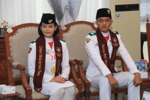 Celine Olivia Apriani Theo dan Mirza, berhasil menjalankan tugas dalam rangkaian upacara HUT ke-81 Kemerdekaan Republik Indonesia di Istana Merdeka